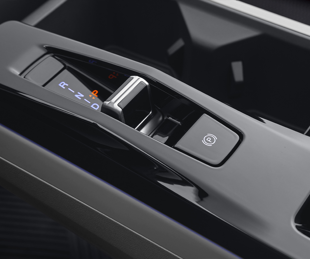 Consola central y selector de marchas de la transmisión automática AISIN de 6 velocidades en KGM Torres Hybrid 2026