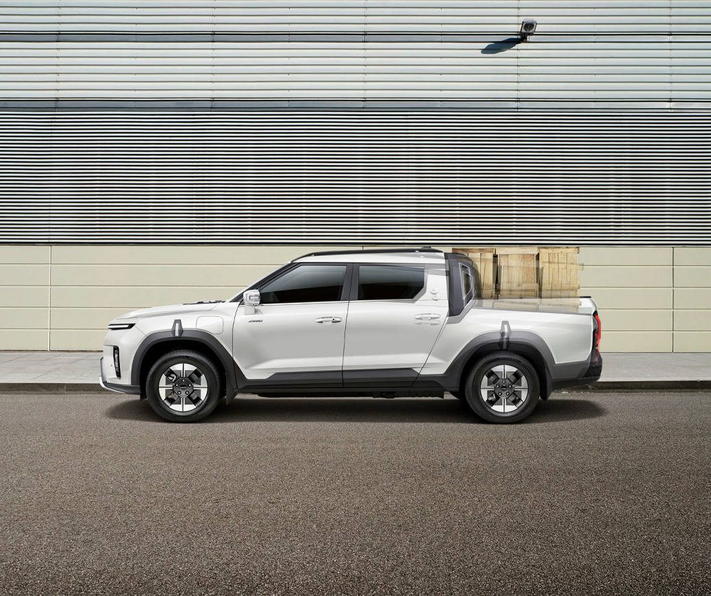 Capacidad de baúl y espacio de carga SUV KGM Actyon 2026 - Maletas y equipaje en compartimento trasero con piso plano