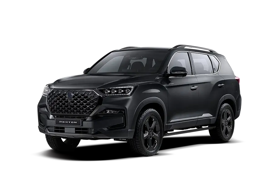 SUV grande KGM Rexton negro de 7 pasajeros con tracción 4x4 y parrilla diamantada.