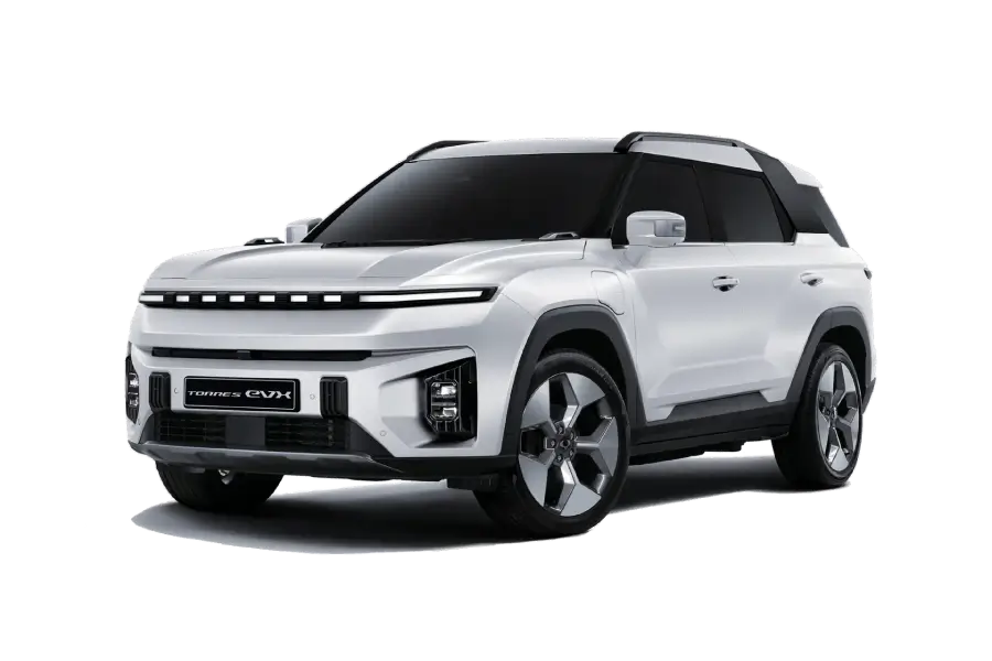 SUV 100% eléctrico KGM Torres EVX blanco con techo negro y firma lumínica LED frontal.